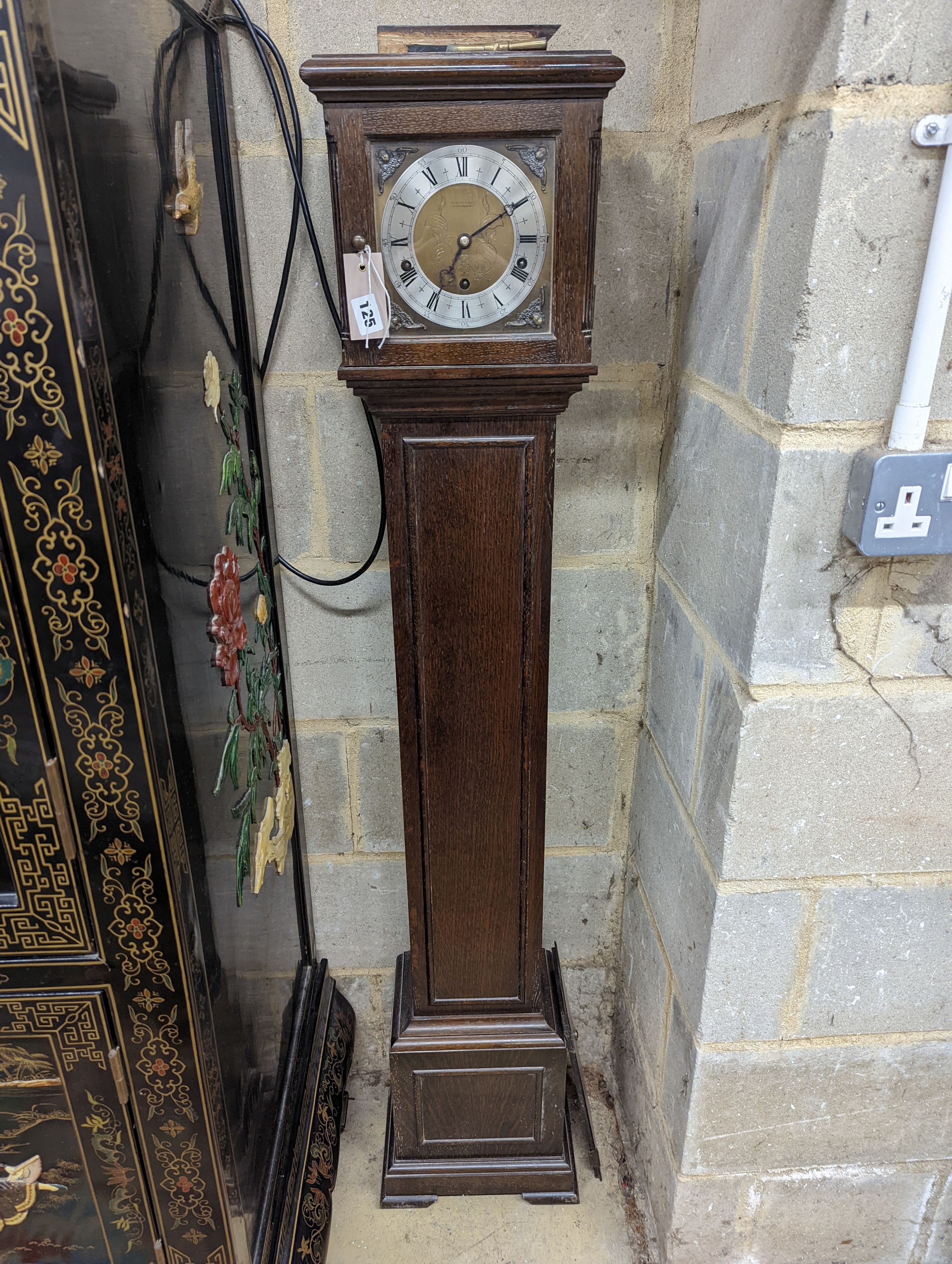 A 1920's oak cased grandmother clock, height 143cm